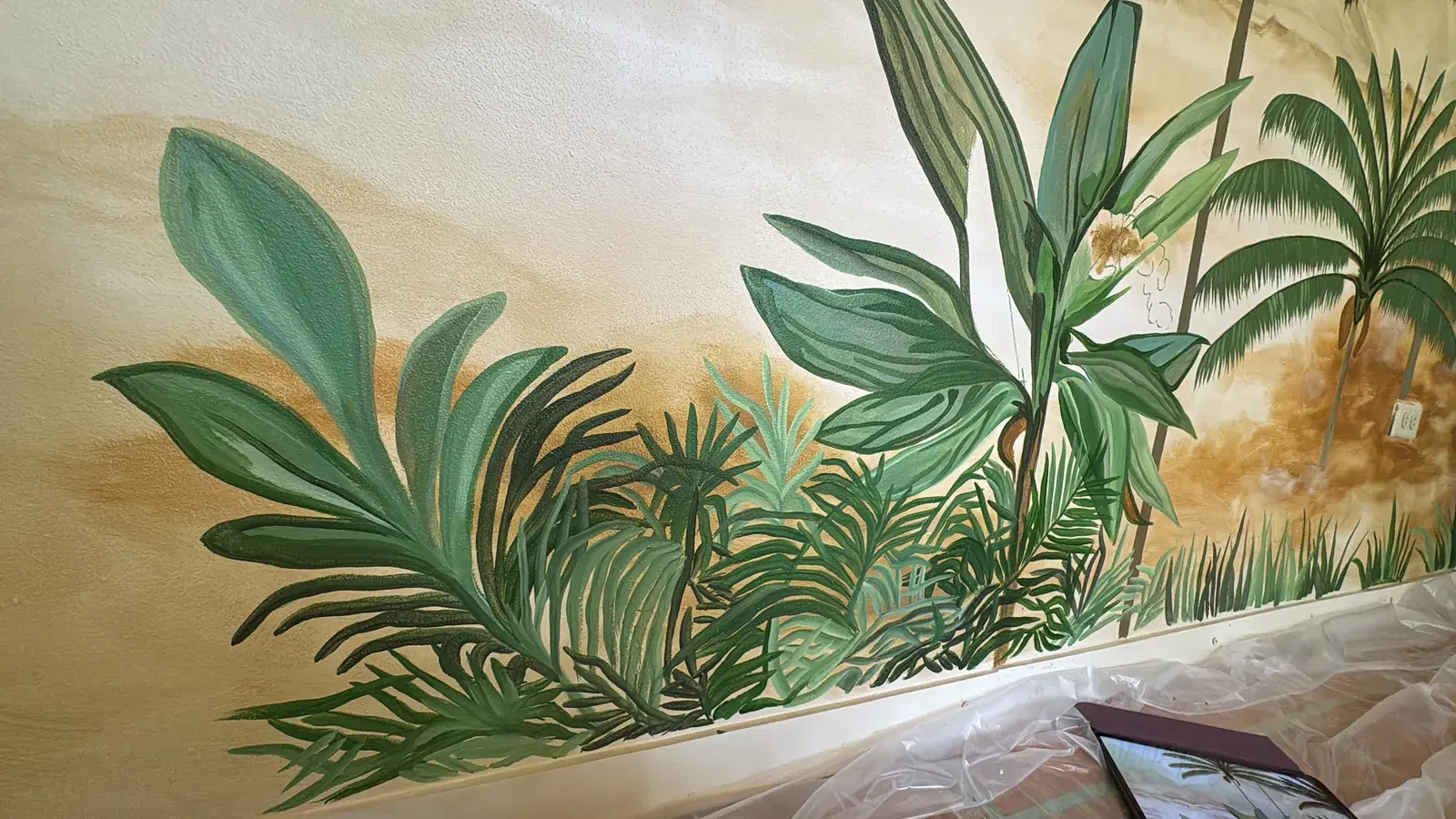 Hand-painted mural by Courtney Edwards