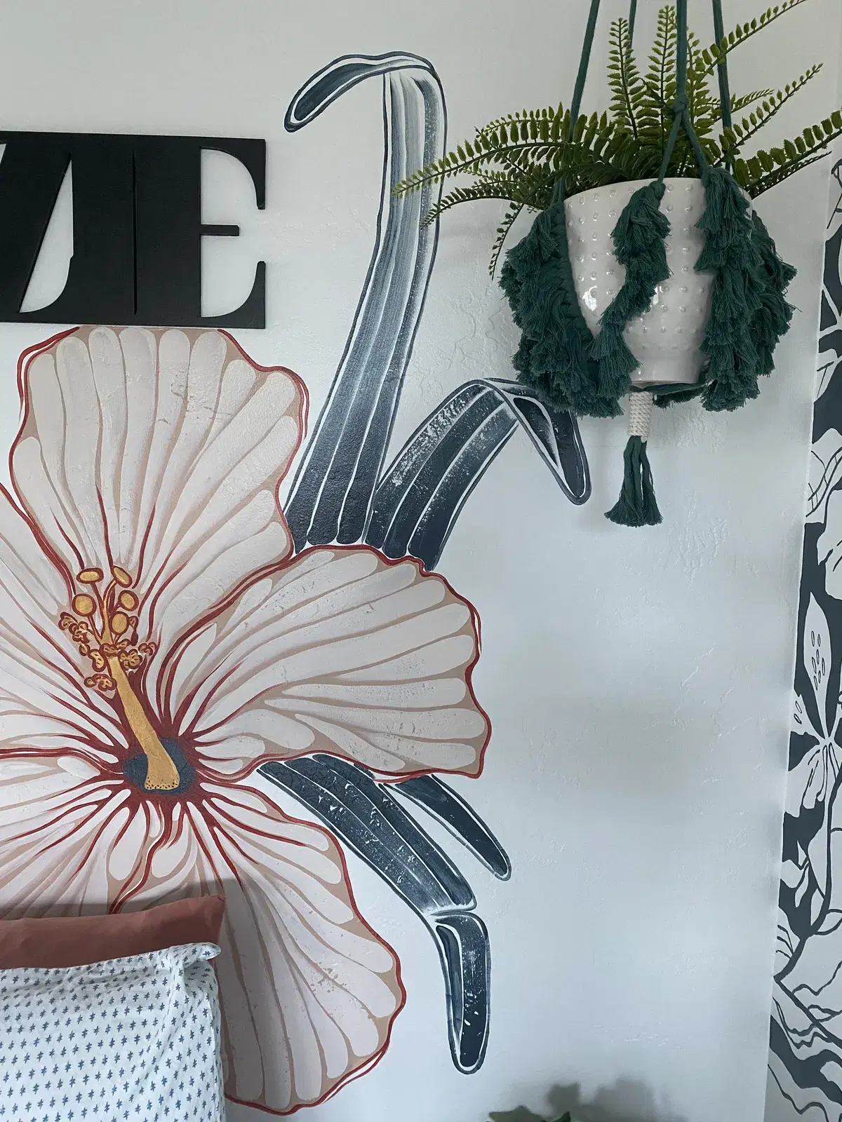 Hand-painted mural by Courtney Edwards