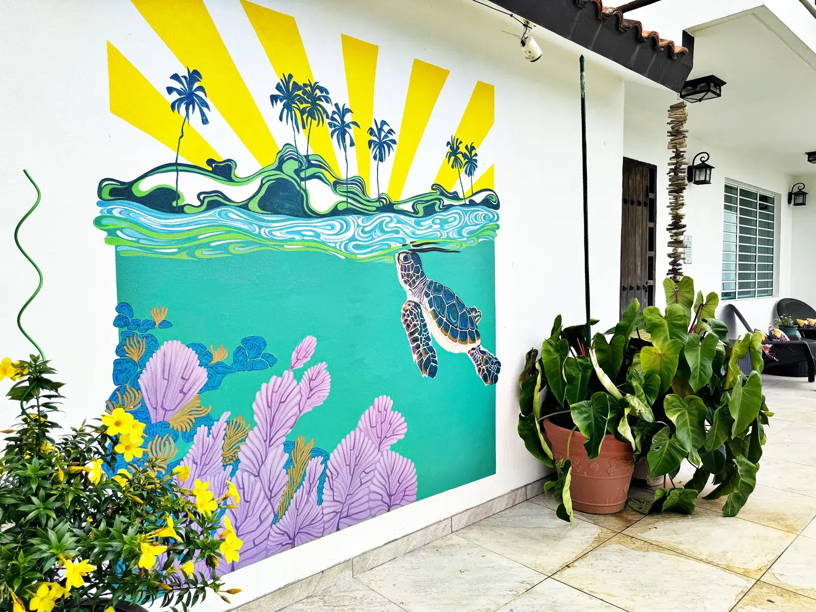 Hand-painted mural by Courtney Edwards