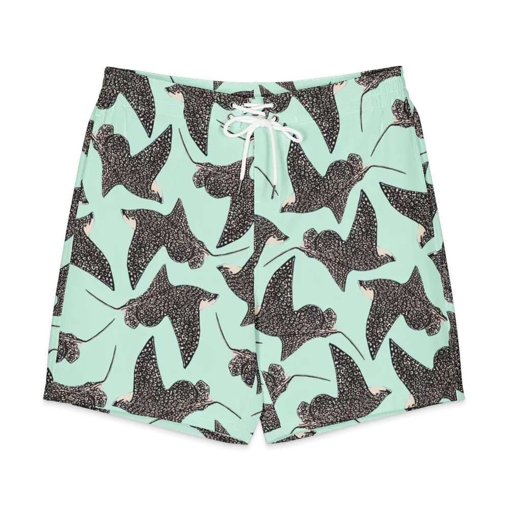 Mint green men’s board shorts in a spotted eagle ray print, with a white drawstring